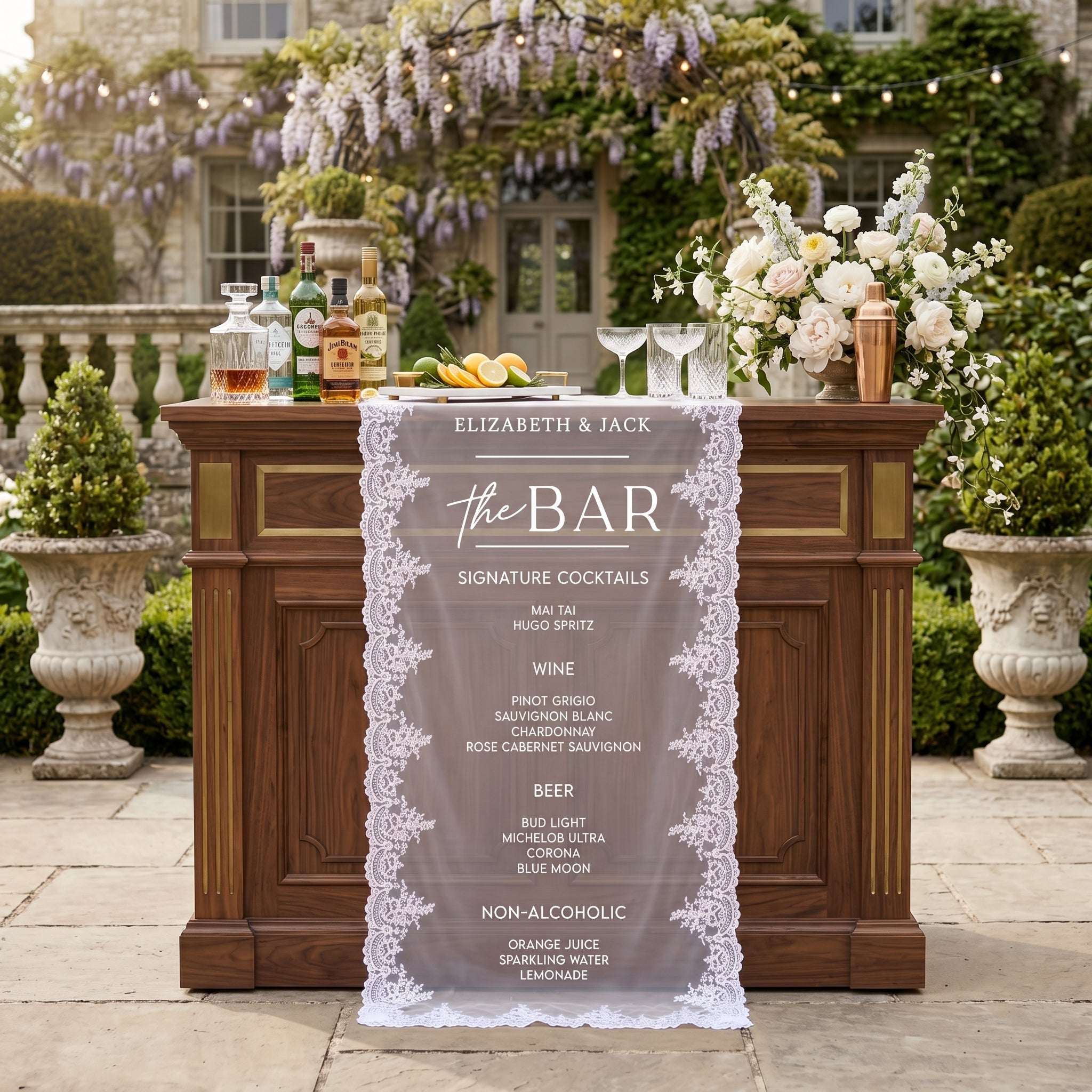 Personalized sheer lace wedding welcome banner draped over a table