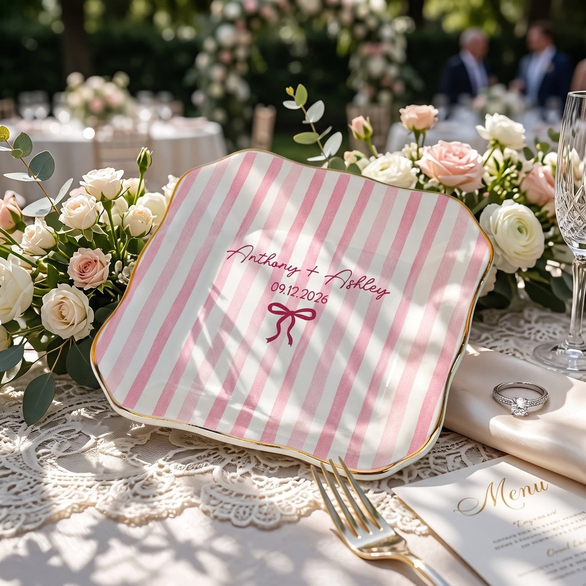 Personalized ceramic ring dish at a wedding table
