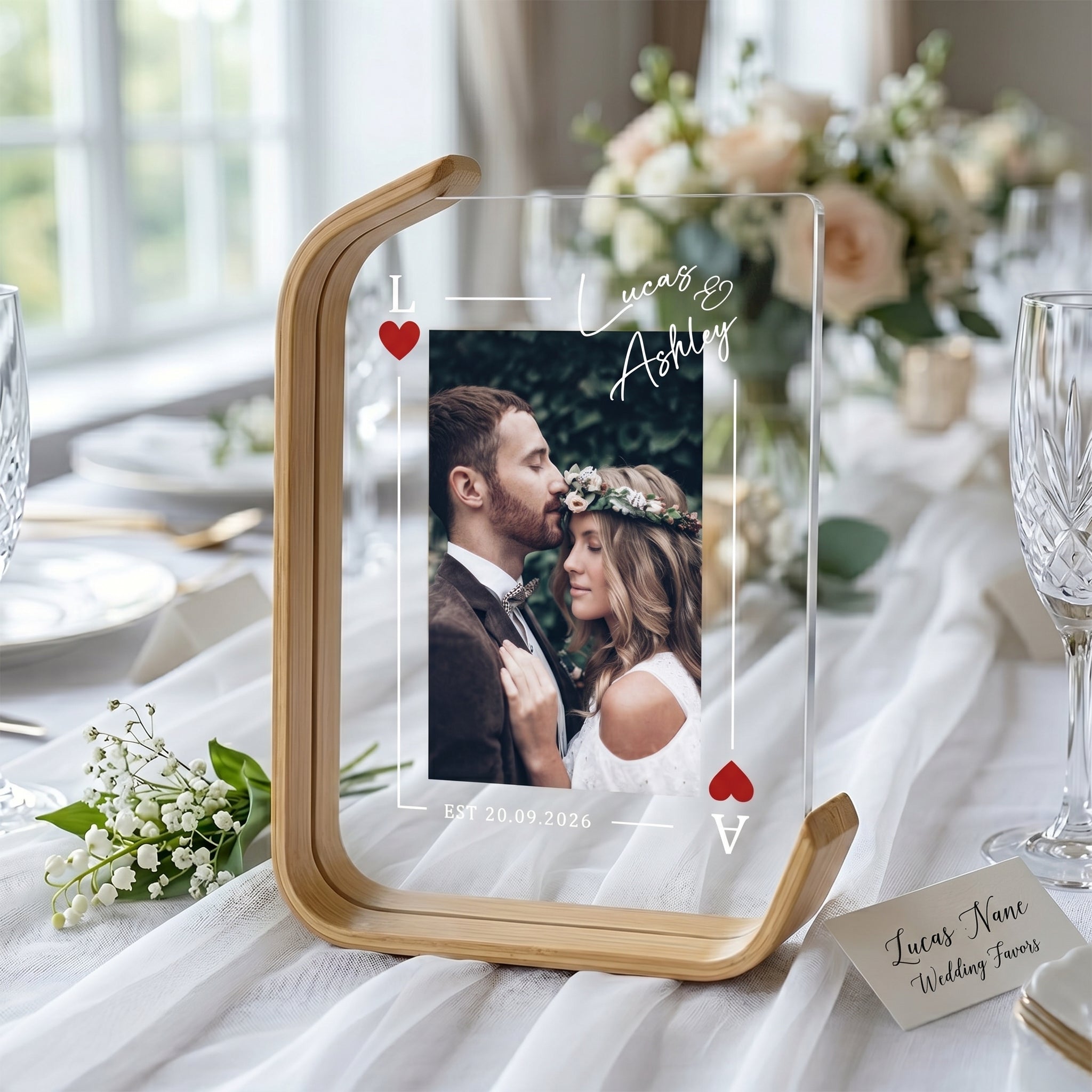 Wedding photo frame displayed at a reception table setting