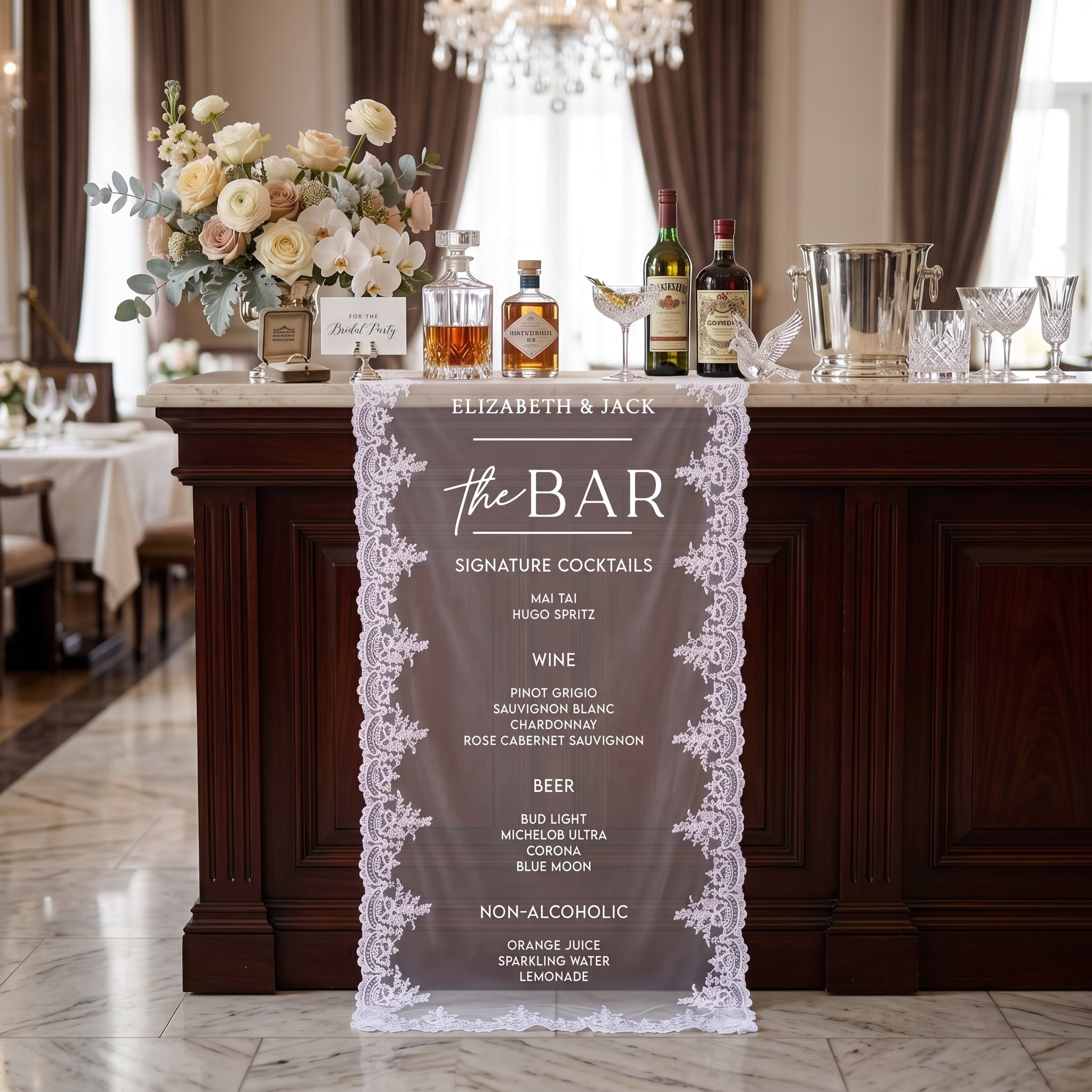 Sheer lace wedding bar sign styled in an elegant reception